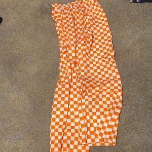 Orange and white checkered pants